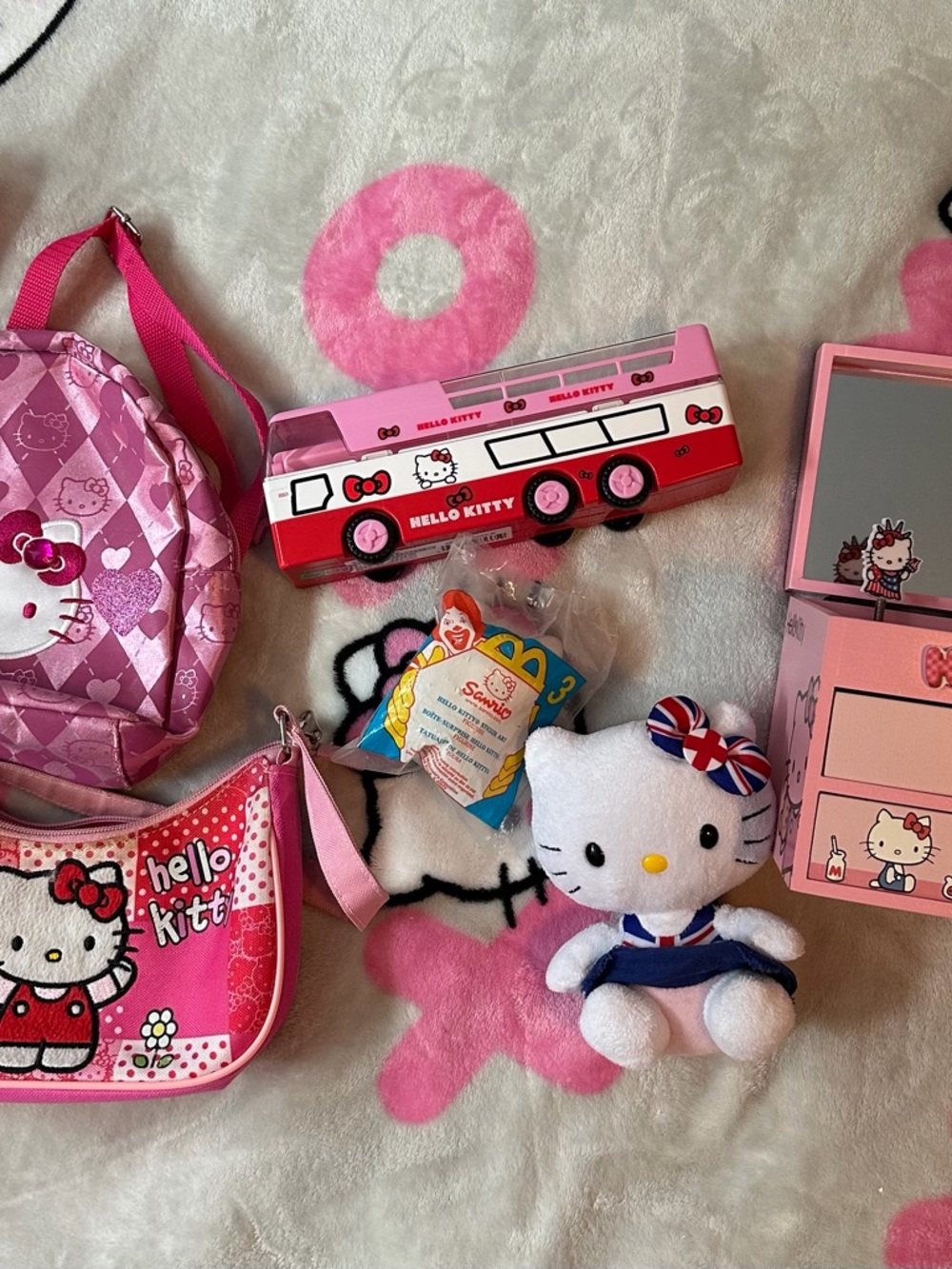 Sanrio Hello Kitty bundle collection: purse, bag, plushie, McDonald’s toy, etc.